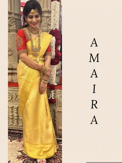 A timeless look for a South Indian wedding. This client wears a classic yellow silk saree paired with a contrasting red blouse that I custom-embroidered to match her jewelry.