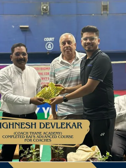 Coach Vighnesh Devlekar being felicitated for completing the Badminton Association of India's advanced course for coaches, highlighting our commitment to coaching excellence.