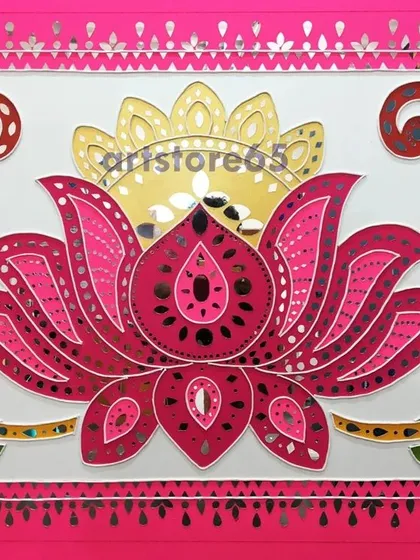 A close-up of a modern lotus motif, handcrafted with bright pinks and intricate mirror placement. This style of Lippan wall decor is perfect for adding a contemporary yet traditional touch to living rooms or commercial spaces.