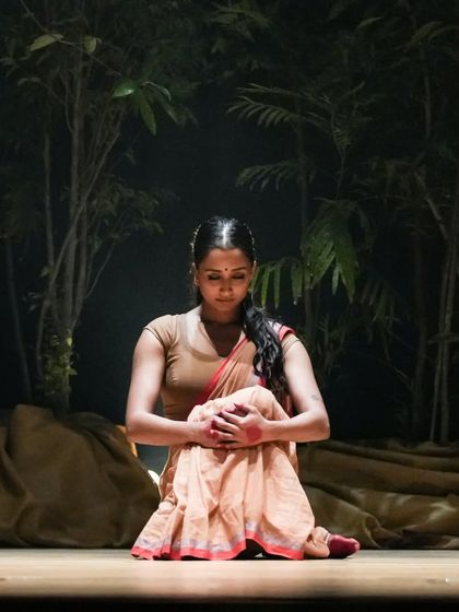 A contemplative solo moment on stage during 'Sitayana'. I use stillness and subtle gestures to convey deep emotion, offering a contrast to the more dynamic parts of a show.