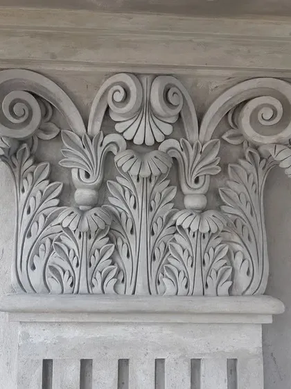 My work is not just about large murals. I also craft fine architectural details like this ornate pillar capital. This type of intricate cement carving adds a touch of timeless elegance and sophistication to any structure, inside or out.