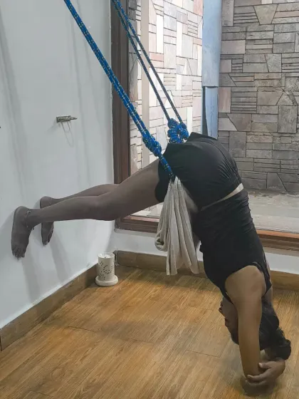 With the help of wall ropes, we can explore advanced inversions and feel a sense of total surrender. This practice helps build strength and offers a new perspective, both physically and mentally.