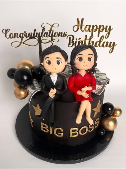 Another view of the "Big Boss" couple cake, showing the fun and celebratory design.