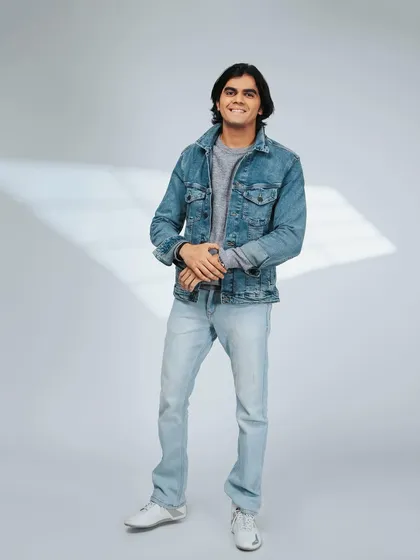 A great male portfolio needs to show personality. This full-body shot has a relaxed, confident vibe, perfect for showcasing a casual denim look.