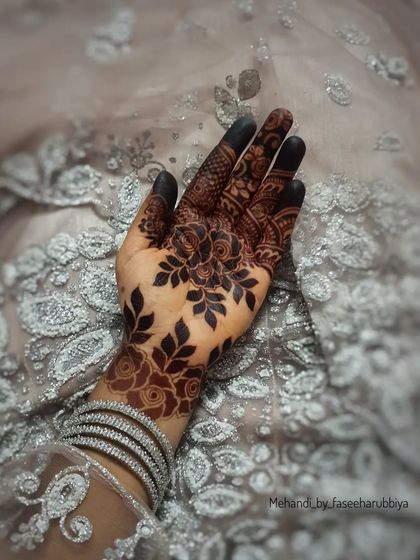 Another angle of this beautiful dark stain, complemented by the client's silver bangles.