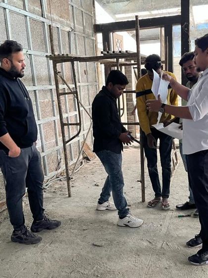 A site meeting in progress. Constant communication and on-site supervision are key parts of my turnkey process, ensuring the design vision is executed perfectly.