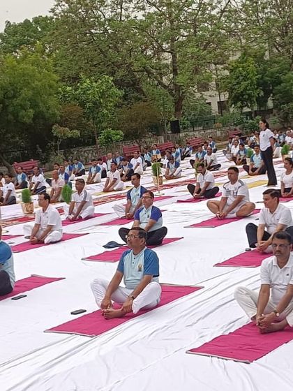 A sea of mats at our International Day of Yoga event in Delhi. Hundreds gathered to practice Baddha Konasana (Butterfly Pose) together, creating a powerful collective energy.