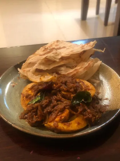 Egg roast is another classic comfort food from Kerala. Hard-boiled eggs are simmered in a spicy onion and tomato masala. It’s best enjoyed with flaky parottas or appams for breakfast or dinner.