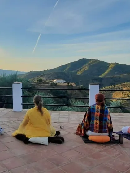 Students engage in morning meditation at our retreat in Málaga, Spain. We practice in serene natural settings, allowing the beauty of the surroundings to quiet the mind and deepen the meditative experience.