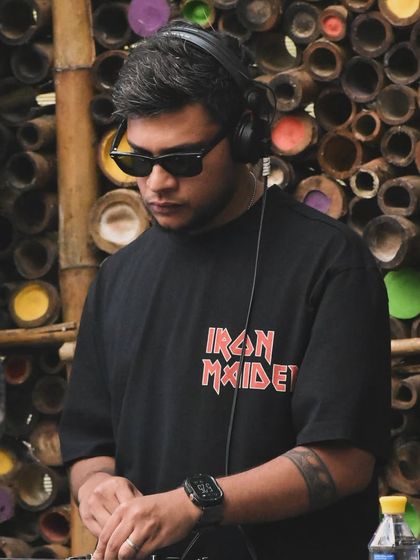 A focused shot of me during a Sunday brunch set at Jinis Cafe. Even in a more relaxed environment, my focus is always on delivering the perfect musical experience.