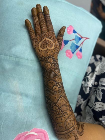 The back of the hand, featuring another heart design. I can place these personal touches wherever you like.