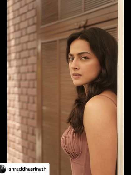 A side profile shot that captures the soft, romantic feel of this look, with a focus on natural beauty and understated elegance.