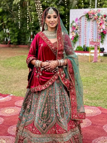 A full-length view of this bride's magnificent velvet lehenga. I created a soft, glowing makeup look to balance the richness of the fabric and the intricate embroidery.