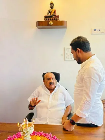 Building trust is at the core of my practice. Here, I am in discussion with Honourable MLA Sukumar Shetty during the inauguration of our new branch office in Uppunda. My goal is to provide reliable financial services that support our community's businesses.