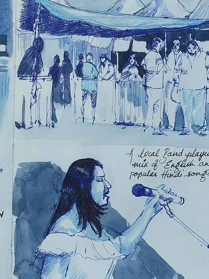 A beautiful ink-wash sketch of a live band performing and the crowd at the food stalls.