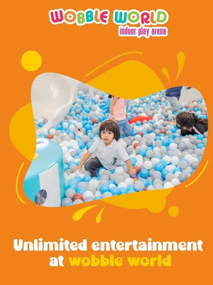 Unlimited entertainment is our promise. This action shot in the ball pit shows the energy and excitement that fills our space.