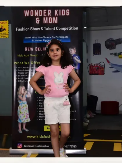 Hands on her hips, this participant is ready to walk the runway. It's this kind of confidence that we love to nurture.