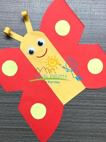 A cheerful paper butterfly craft with googly eyes. This is a classic, easy craft that always brings a smile to a child's face.