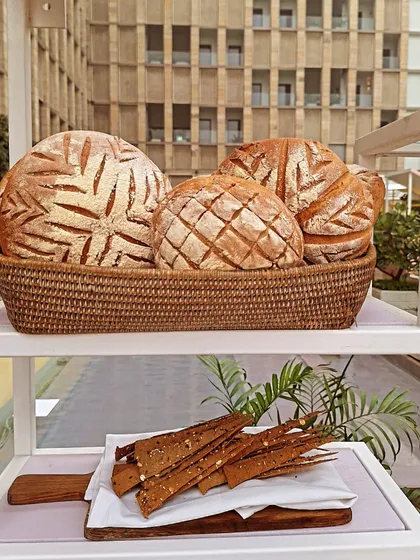 A basket of freshly baked artisanal breads. The smell alone was divine.