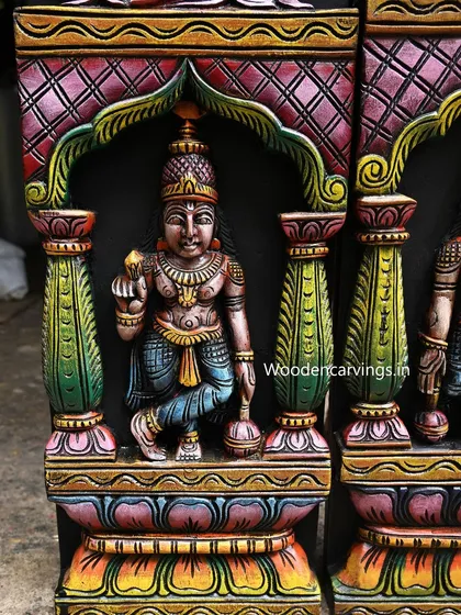 Another view of the lower deity figure, showing the fine painting on the pillars and archway. This demonstrates our attention to every part of the carving.
