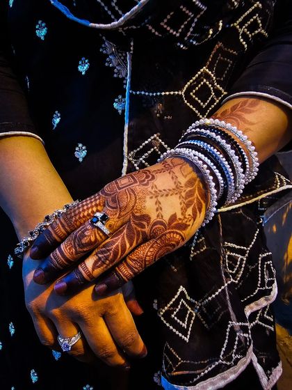 A beautiful shot of the mature stain, accessorized with black and white bangles.