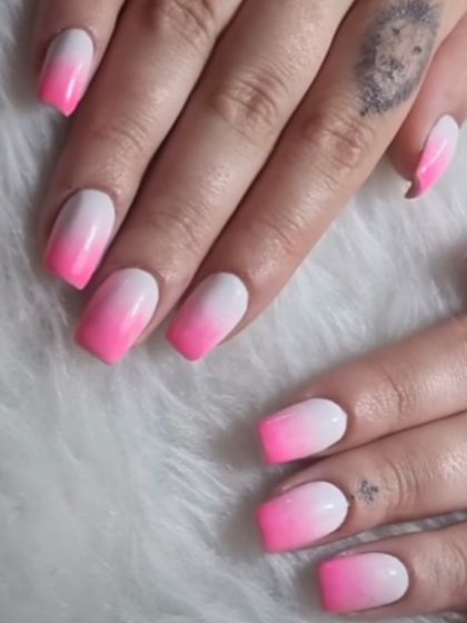 A classic pink and white ombré on square-shaped nails. This is a fun and feminine look that's always in style.