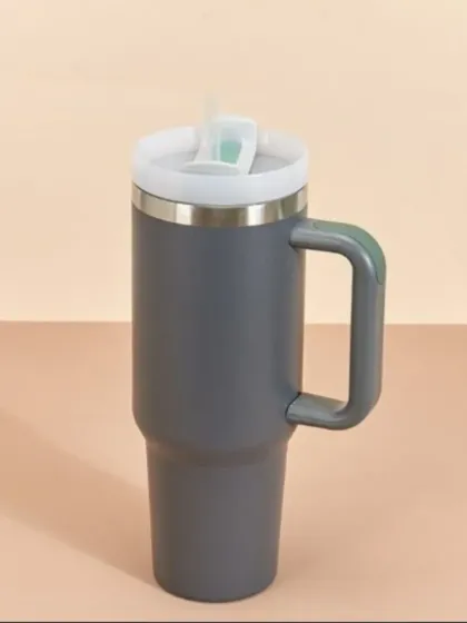 Here is the large 1-liter stainless steel travel mug in a sleek grey color. It's a practical and durable choice for daily use.