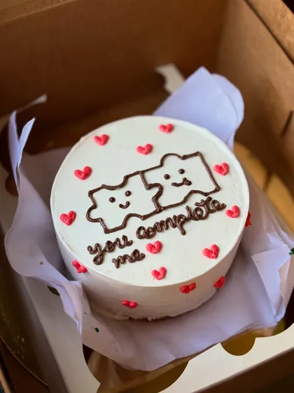 "You complete me." This adorable puzzle piece bento cake is a perfect anniversary or Valentine's treat for your other half.