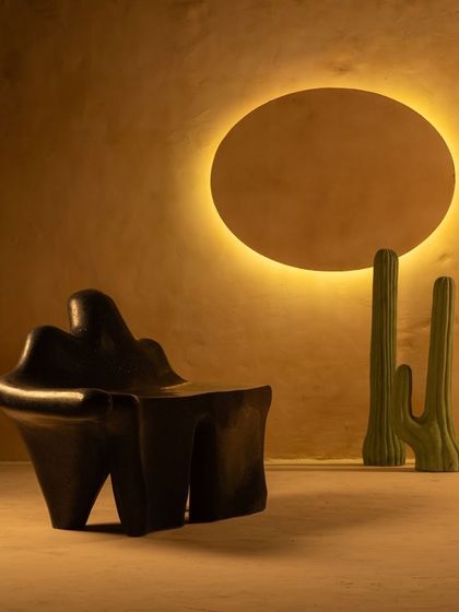 This perspective shows the dynamic, unconventional shape of the Coral Seating bench. It’s a piece that invites you to look closer and appreciate the harmony between its organic form and solid material.