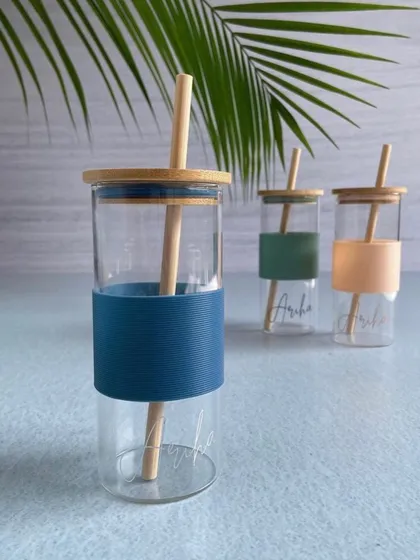 Life's too short for boring drinkware. Our new personalised can glass tumbler comes with a bamboo lid, a wooden straw, and a chic silicone sleeve.