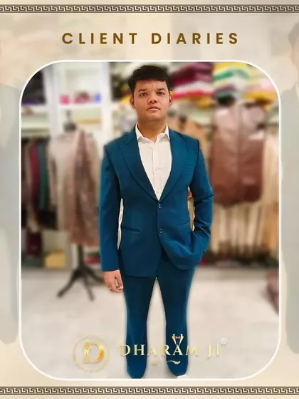 A client looking sharp in a vibrant teal-blue suit. The custom fit ensures he looks polished and professional.