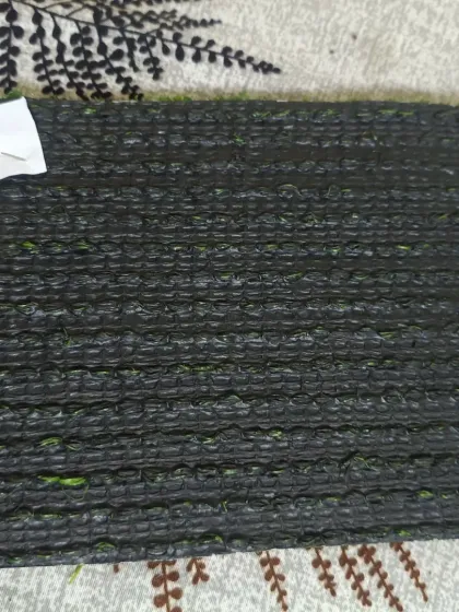 A close look at the double backing for the 30mm artificial grass. This sturdy base is suitable for both indoor and outdoor installations that require extra resilience.