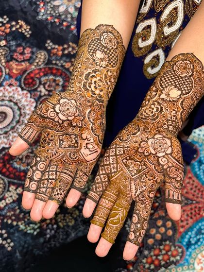 A lovely design with a mix of floral and geometric patterns. The rose motifs are particularly beautiful.