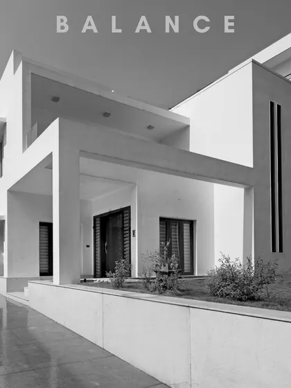 Modern minimalism in perfect balance. This black and white shot emphasizes the clean lines, geometric volumes, and seamless indoor-outdoor flow that define this contemporary residence.