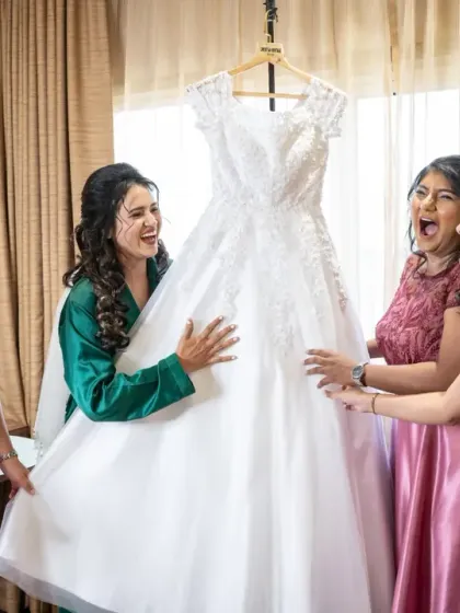 The "first look" with the bridesmaids! Their excited reactions to seeing the bride in her dress is a priceless and joyful moment.