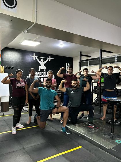 The evening crew celebrating the end of another challenging functional fitness workout.