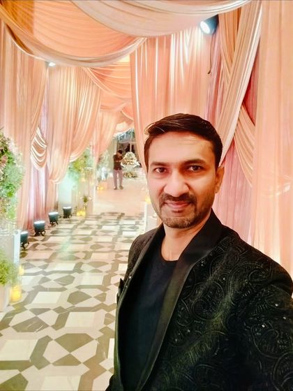 A quick selfie amidst the beautiful draped decor of the Pune event.