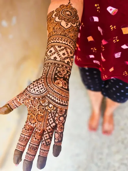 A single arm shot, perfect for seeing the details of the palm and forearm design.