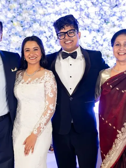 Another lovely family photo. The bride's timeless makeup look ensures she looks graceful and beautiful in all her cherished family pictures.