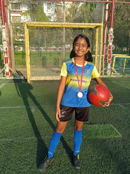 This young girl's hard work and positive attitude earned her the Player of the Month award.