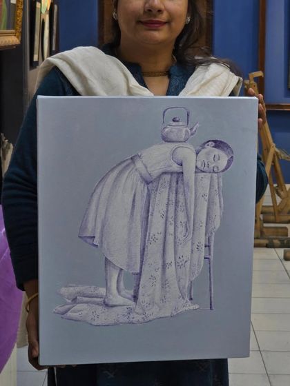 A moment of pride. A student holds up her finished ballpoint pen artwork, a surreal and gentle piece depicting a sleeping figure with a teapot balanced on her head.