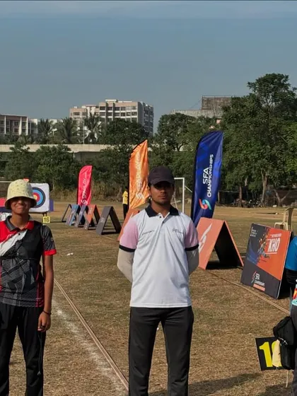 Archers stand at their designated spots during the SFA Championships, waiting for the signal to begin shooting.