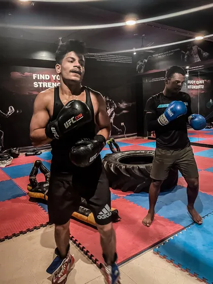 Two fighters after a hard round of training. This is the look of exhaustion and determination. My gym is for people who are ready to fight for their goals and push past their limits.