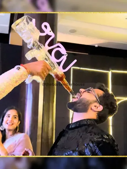 Taking shots to a whole new level. This custom "baraat" bottle is one of our signatures, making for a great photo opportunity and a fun memory for the groom.