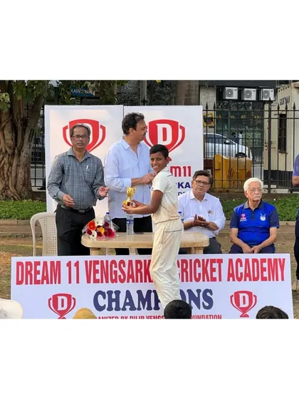 Anish Tambe being awarded Man of the Match for his contribution during the tournament.