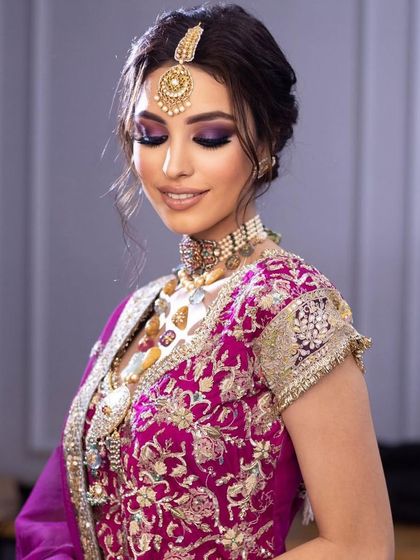 A regal bridal look with a purple smokey eye. Learn to create such majestic looks in my upcoming Delhi course.