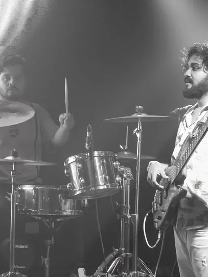 The rhythm section, our drummer and bassist, holding down the groove. A solid foundation is key to our tight, powerful sound, perfect for getting people to dance.