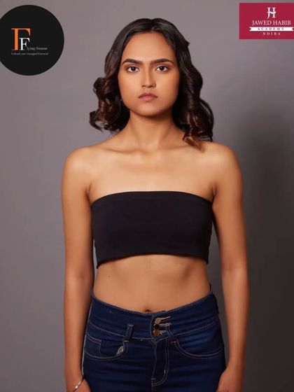 A "before" shot from a professional portfolio shoot, showing the model ready for her transformation by our students.