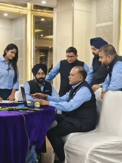 A behind-the-scenes moment, coordinating with the event team to ensure everything runs on schedule.