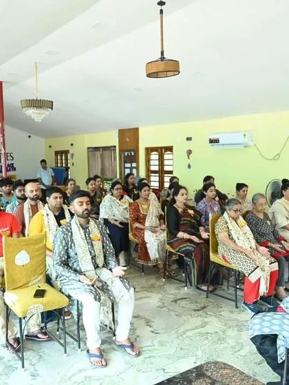 Participants listening intently during a Satsang session in Puri.